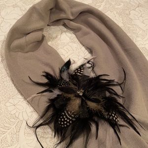 Gray scarf with feather pin